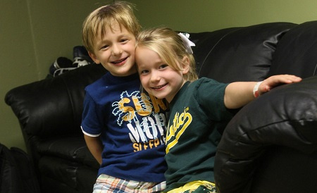 Billy Beane's twins with his life partner Tara Beane