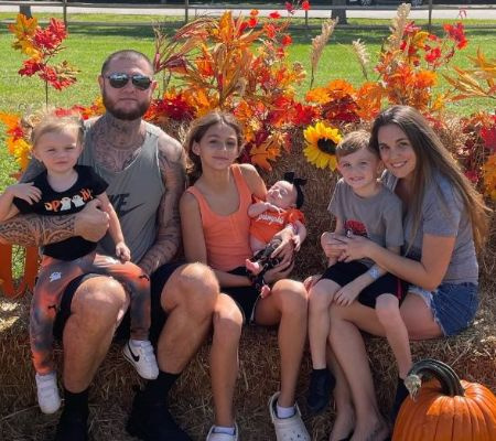 Bhad Bhabie's bodyguard, Frank and his wife, Anna with their four kids