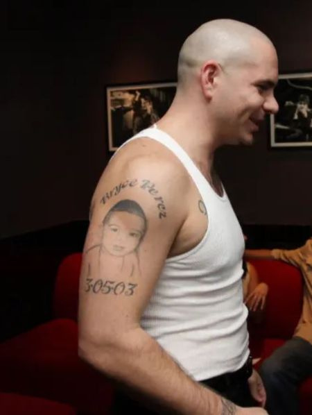 Barbara Alba's Ex-boyfriend Pitbull With Their Son's Tattoo On His Arms