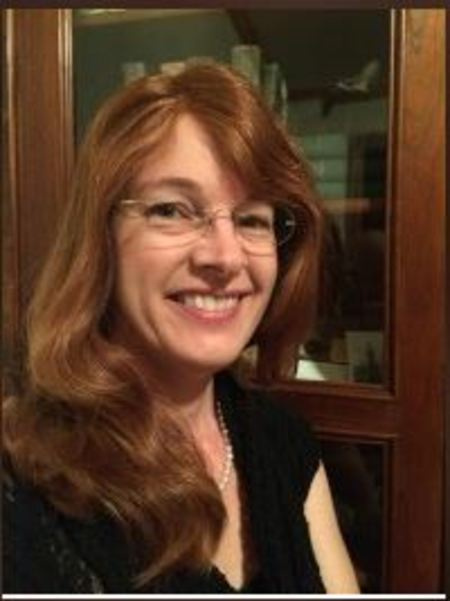 Kim Harrison creció como la única niña entre una familia de niños.
