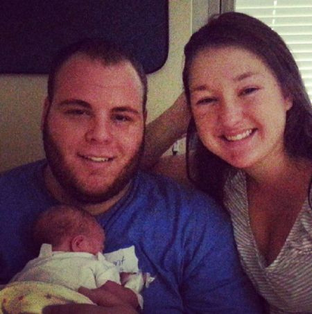 August Ann Brooks com seu marido e filha