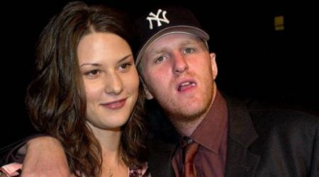 A escritora e produtora executiva de Law And Order Organized Crime, Nichole Beattie, e seu ex-marido e ator Michael Rapaport.