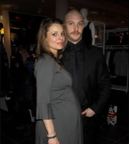 Louis' biological mother and casting director, Raechel Speed and his father, Tom Hardy.