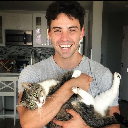 Olivia Macklin's boyfriend with their cat