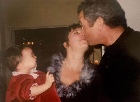   Houghton con suo marito Mark Zettel e la loro figlia