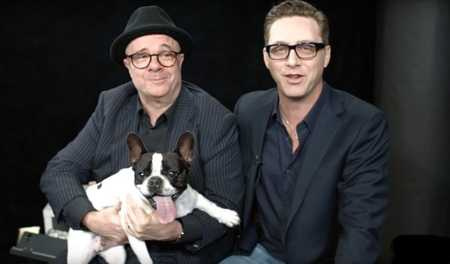 Elliot's and his husband, Nathan Lane and their child, Mabel (French bulldog pet)