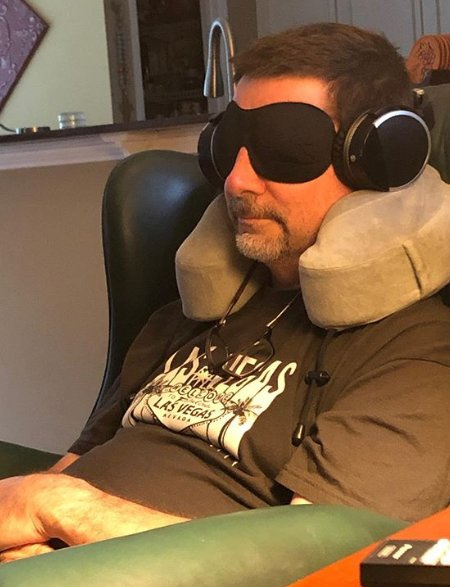 Madelyn Cline's father Mark Cline listening to music