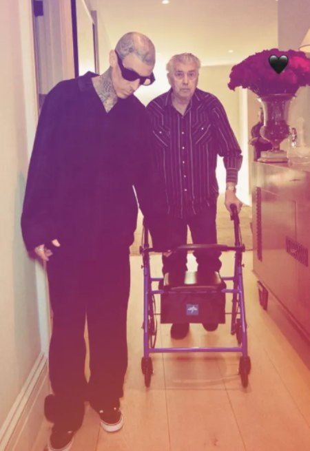 Gloire's husband with her son in the picture