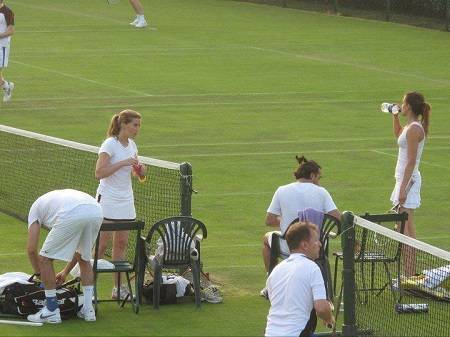 Hugh Grant's wife Anna Eberstein playing tennis.