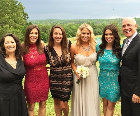   alex curry's parents and three sisters. 