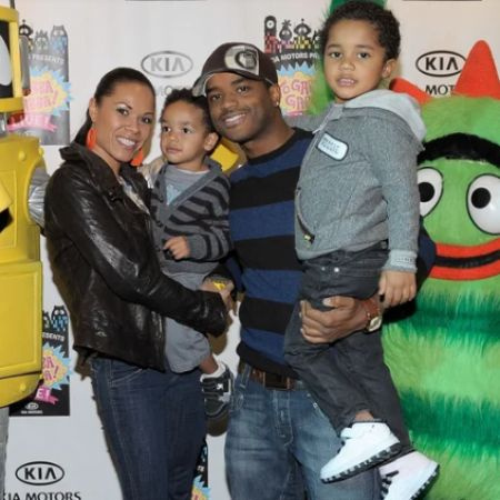   Zander's parents with him and his brother