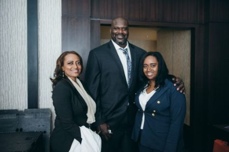 Shaq O'Neal in the middle with his ex-girlfriend, Arnetta Yardbourgh, in left, and their daughter Taahirah