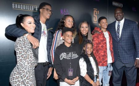 Shaunie O'Neal (L), NBA legend Shaquille O'Neal (R) and family attend the grand opening of Shaquille's At L.A. Live at LA Live on March 09, 2019 in Los Angeles, California. Michael Tullberg, Getty Images.