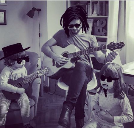 Blanca Clemente's husband with their twins.
