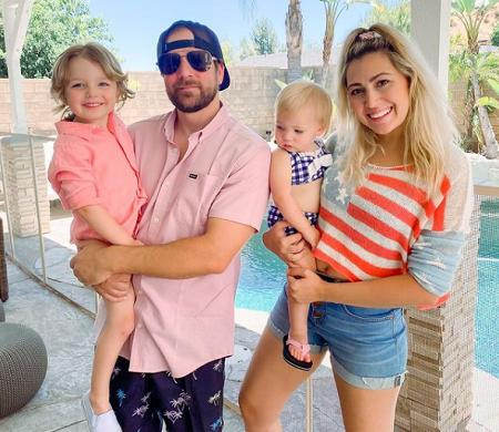   taylor dooley's two kids with her husband. 
