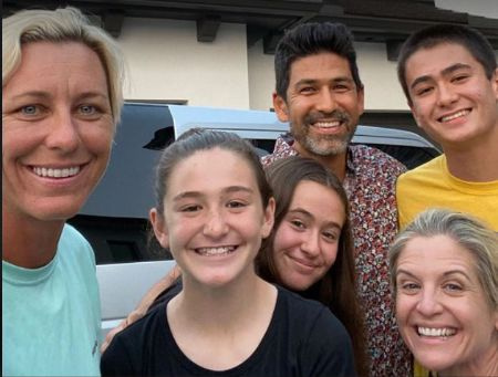 's three children and Abby Wambach.