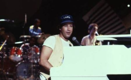   Susanne's ex-husband palying piano