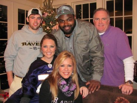   Michael Oher con la familia Tuohy
