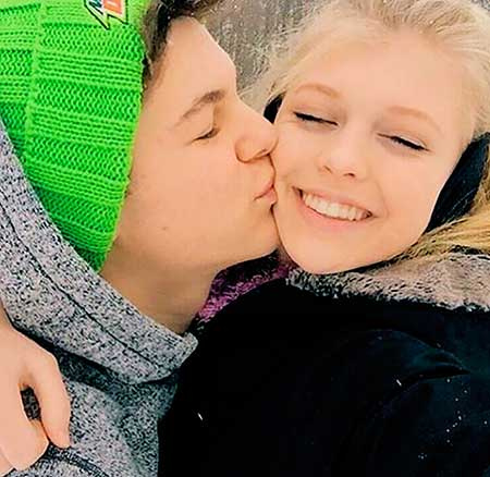   loren gris's ex-boyfriend Joey Kisluk kisses her in the cheek