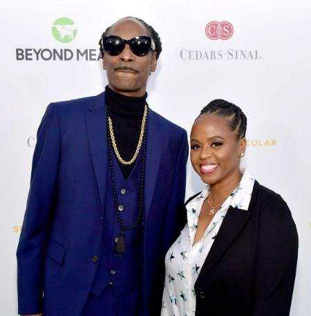 Laurie Holmond's former partner is married to Shante Broadus.