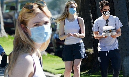 El novio de Elle Fanning, Max Minghella, fueron vistos juntos usando una máscara en Los Ángeles