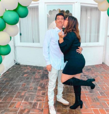 Olivia con su pareja.