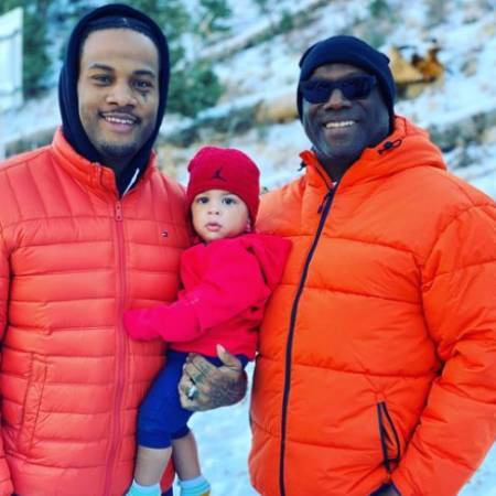   Daniel Saunders ao lado de seu filho e neto