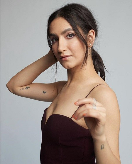 Nikohl Boosheri's tattoos