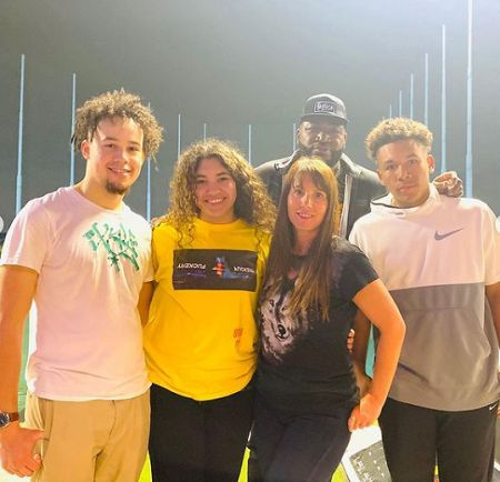   David Ortiz's kids and wife.