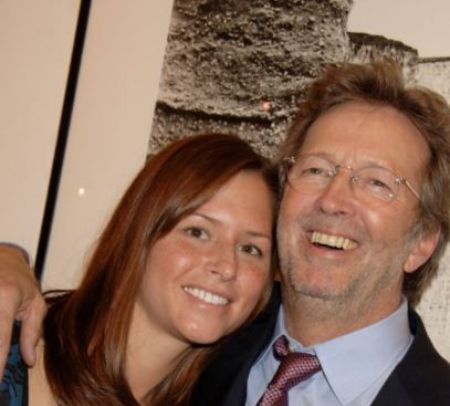 Sophie Belle Clapton's mother, Melia McEnery and her father, Eric Clapton.