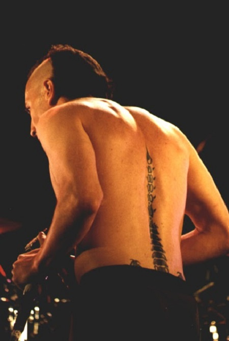 maynard james keenan's Scorpion tattoo.