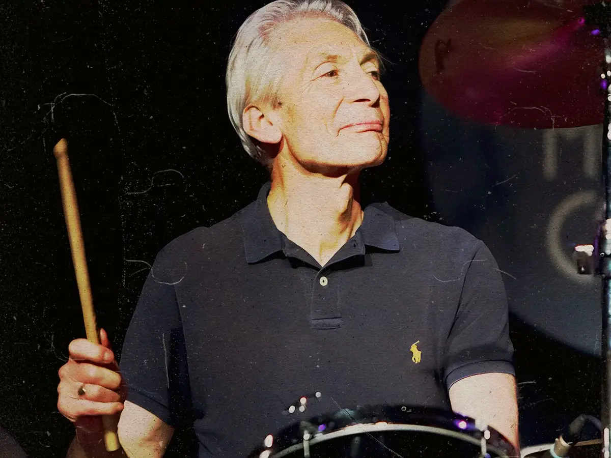 Qual membro interpretou Charlie Watts Best em Rolling Stones?